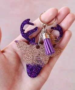 The Cinchy Cowgirl Purple & Champagne Deer Keychain