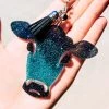 The Cinchy Cowgirl Teal & Black Cow Head Keychain