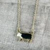 Blue Tortoise Jewelry Black & White Cowhide Pig Necklace