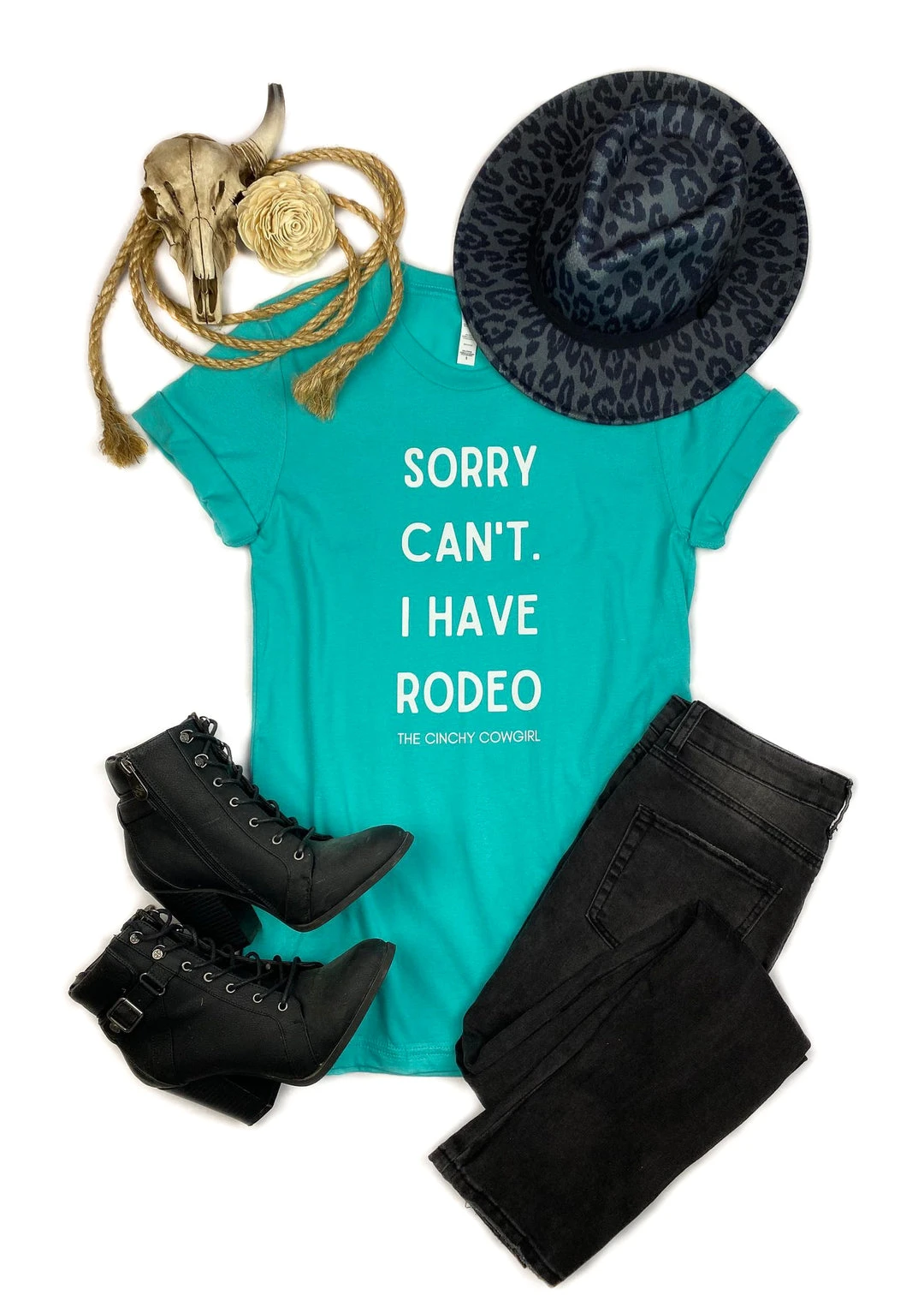 The Cinchy Cowgirl "Sorry I Can't I Have Rodeo" Teal Short Sleeve Graphic Tee - Stylish Rodeo-Themed Clothing 3 The Cinchy Cowgirl Sorry I Can't I Have Rodeo Teal Short Sleeve Graphic Tee Clothing