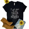The Cinchy Cowgirl Clothing Black Eat Tacos & Ride Horses Short Sleeve Graphic Tee