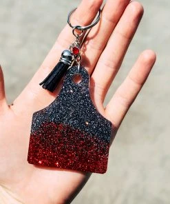The Cinchy Cowgirl Black & Red Ear Tag Keychain