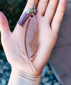 The Cinchy Cowgirl Resin Keychains Champagne Feather Keychain