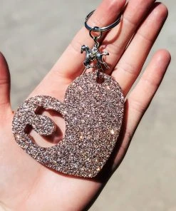 The Cinchy Cowgirl Champagne Heart Horseshoe Keychain