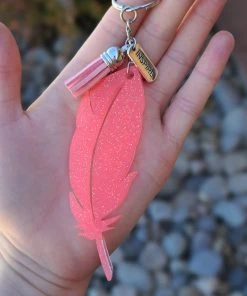 The Cinchy Cowgirl Coral Feather Inspire Keychain