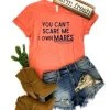 The Cinchy Cowgirl Clothing Coral You Can't Scare Me I Own Mares Short Sleeve Graphic Tee