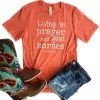 The Cinchy Cowgirl Clothing Coral Living On Prayer Short Sleeve Graphic Tee