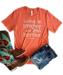 The Cinchy Cowgirl Clothing Coral Living On Prayer Short Sleeve Graphic Tee
