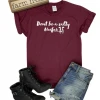 The Cinchy Cowgirl Maroon Salty Heifer Short Sleeve Tee