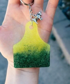 The Cinchy Cowgirl Accessories, Gifts & More Green & Yellow Ear Tag Keychain
