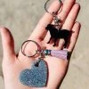 The Cinchy Cowgirl Resin Keychains Black Goat & Holographic Silver Heart (Set Of 2) Keychain