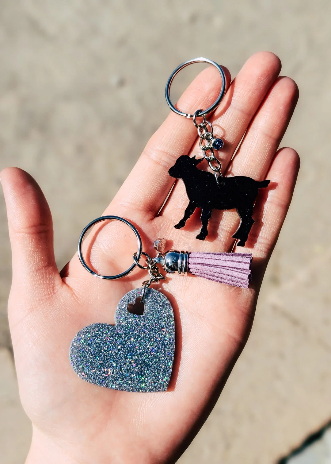 Cinchy Cowgirl Resin Keychain Set - Black Goat & Holographic Silver Heart (Set of 2) - Unique Accessories & Gifts 3 The Cinchy Cowgirl Resin Keychains Black Goat & Holographic Silver Heart (Set Of 2) Keychain