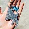 The Cinchy Cowgirl Holographic Silver Jumping Goat Keychain