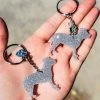 The Cinchy Cowgirl Holographic Silver Pitbull Mini (Set Of 2) Keychain Resin Keychains