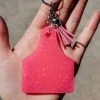 The Cinchy Cowgirl Resin Keychains Hot Pink Ear Tag Keychain