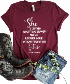 The Cinchy Cowgirl Maroon She Is Clothed Short Sleeve Graphic Tee