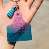 The Cinchy Cowgirl Pink & Blue Ear Tag Keychain Resin Keychains