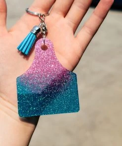 The Cinchy Cowgirl Pink & Blue Ear Tag Keychain Resin Keychains