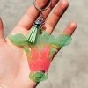 The Cinchy Cowgirl Pink & Lime Cow Head Keychain