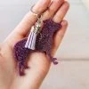 The Cinchy Cowgirl Purple Pitbull Keychain Accessories, Gifts & More