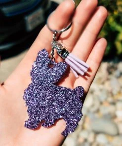 The Cinchy Cowgirl Purple Yorkie Keychain