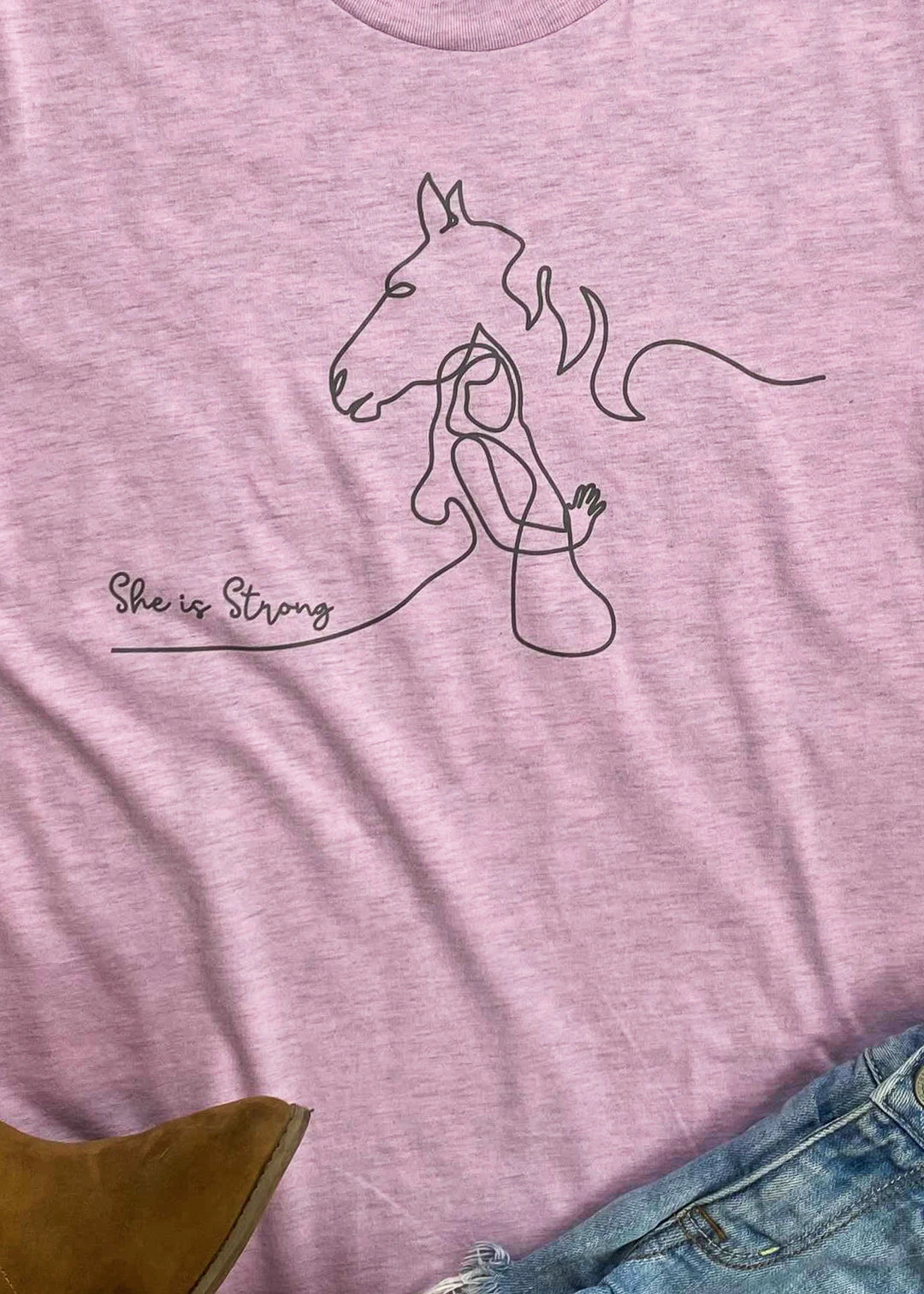 Cinchy Cowgirl Strong Horse Lilac Short Sleeve Graphic Tee - Women's Casual Top 4 The Cinchy Cowgirl Clothing She Is Strong Horse Lilac Short Sleeve Graphic Tee
