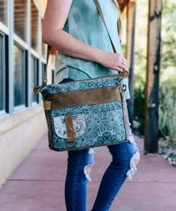 Myra Teal Abstract & Cowhide Pocket Shoulder Handbag