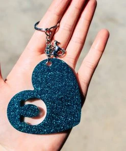 The Cinchy Cowgirl Teal Heart Horseshoe Keychain Resin Keychains