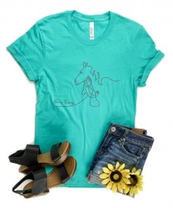 The Cinchy Cowgirl Clothing She Is Strong Horse Teal Short Sleeve Graphic Tee
