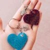 The Cinchy Cowgirl Turquoise & Magenta Heart (set Of 2) Keychain