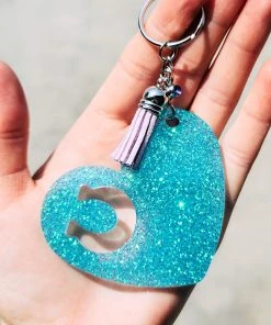 The Cinchy Cowgirl Turquoise Heart Horseshoe Keychain Resin Keychains
