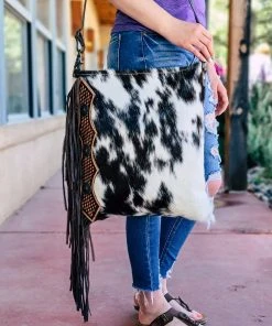 Myra >> MEGA SALE << Hand Tooled Black & White Cowhide Handbag - Premium Leather Bag for Women -The Cinchy Cowgirl Store whiteandblackcowhidefringehandbagmyra5 7dfb7c5d 0688 4e00 bf6c 37b2559e1a73 1080x