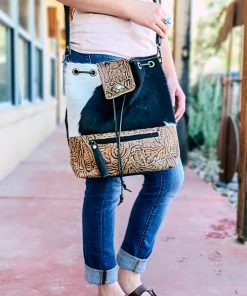 Myra Handbags & Wallets Black & White Cowhide Drawstring Handbag